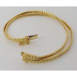 An 18ct gold double strand bracelet, length 19cm, weight 18gms Condition Report: Available upon