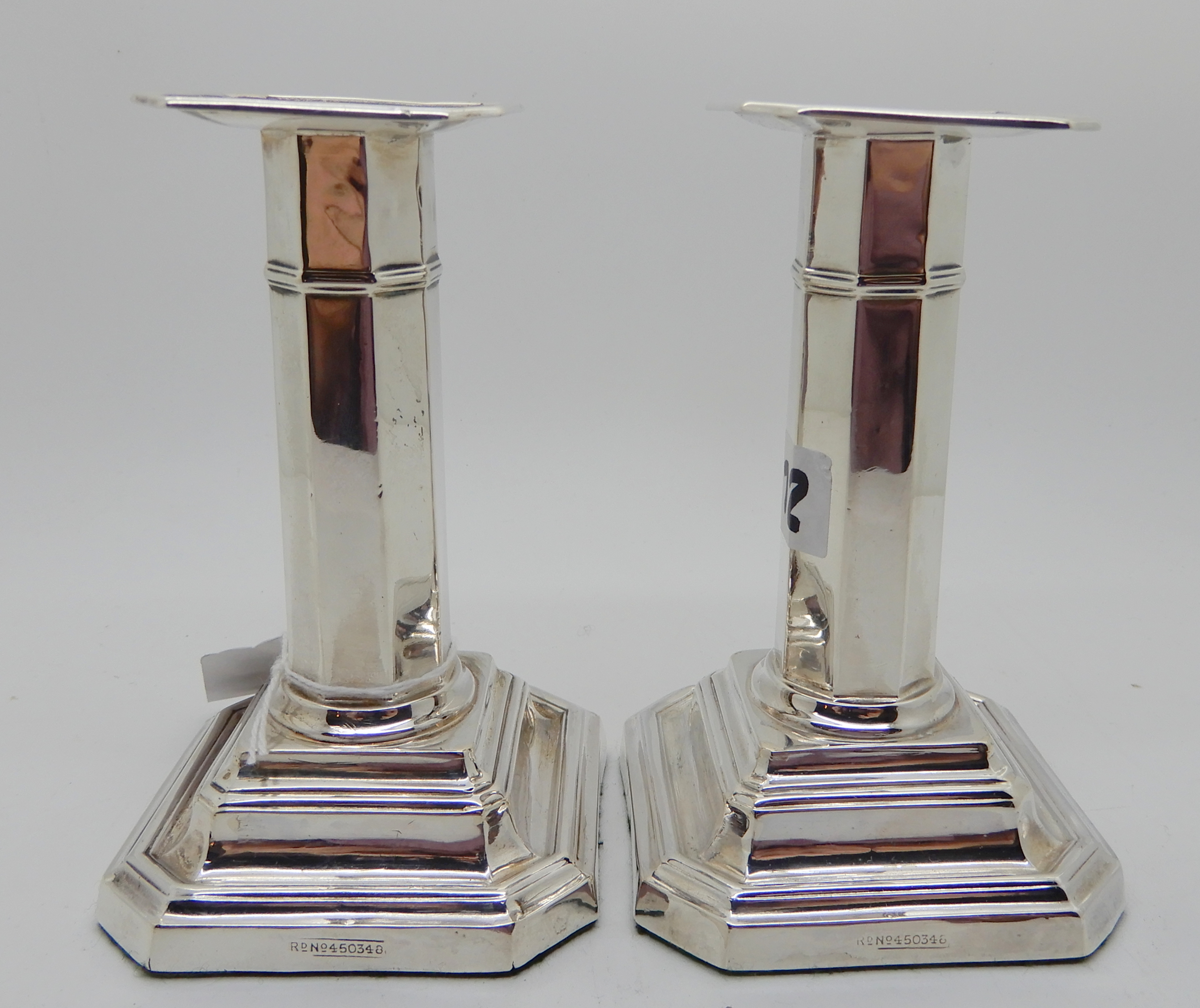 A pair of silver candlesticks, Sheffield 1918, the octagonal stem on stepped square pedestal base - Image 3 of 4