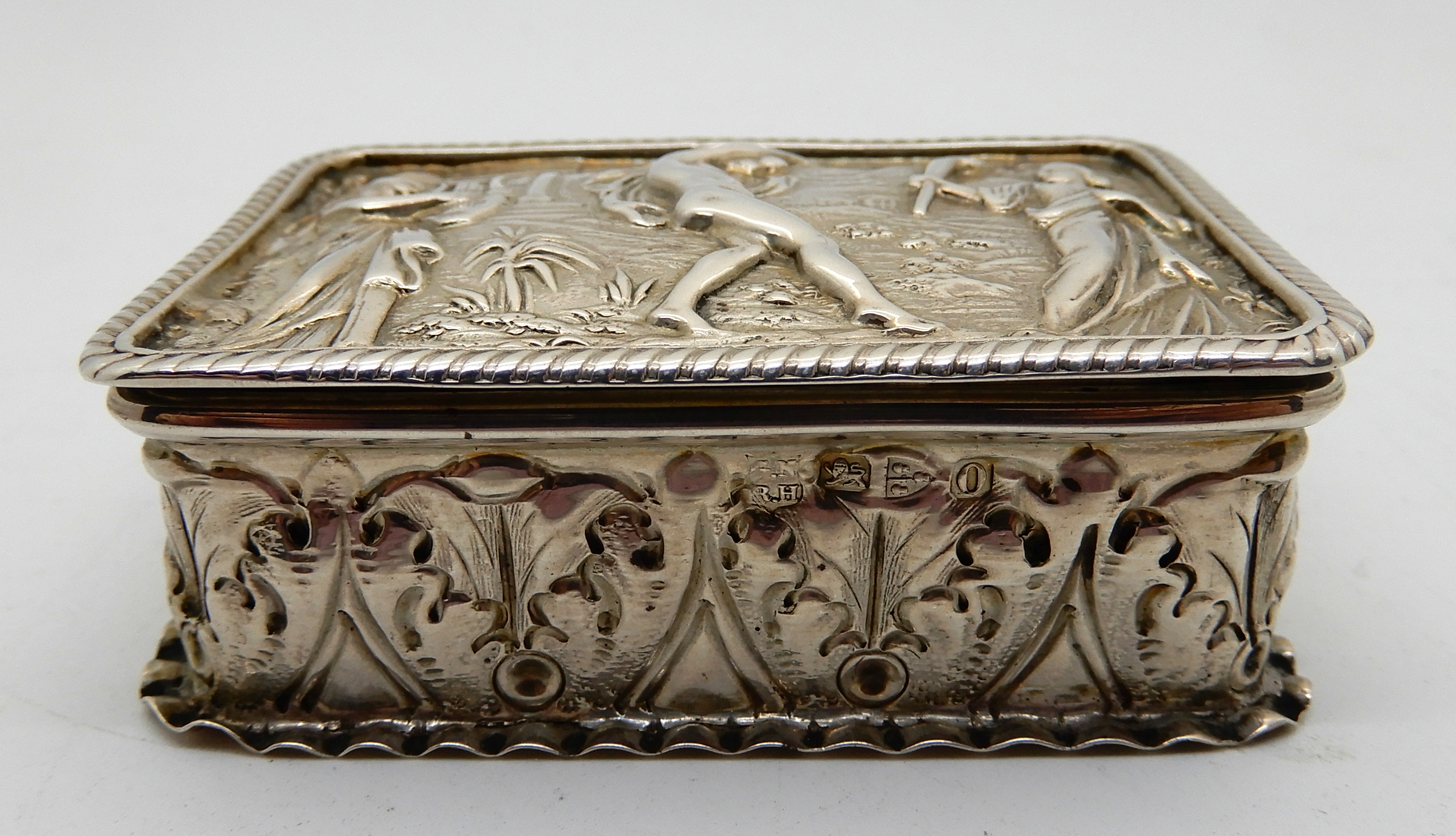 A white metal snuff box, rectangular embossed with classical figures, 6.8cm x 4.8cm - Image 3 of 5