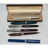 A cased Parker pen set and other pens Condition Report: Available upon request