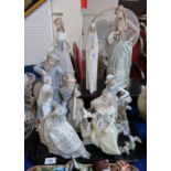 A collection of Lladro and Nao figures Condition Report: