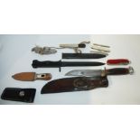 A bayonet, hunting knife and other knives Condition Report: Available upon request