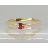 An 18k gold padparadscha sapphire ring, size N1/2, weight 2.7gms. With a GemsTV certificate