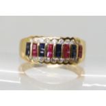 An 18ct gold ruby, sapphire and diamond ring size O, weight 5.5gms With insurance documents for £