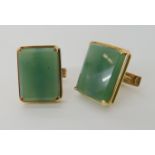 A pair of 18ct gold mounted African green hardstone cufflinks, weight 22.1gms Condition Report: