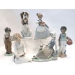 Five assorted Nao and Lladro figures and another Spanish figure Condition Report: Available upon