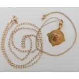 A 9ct gold medallion and chain length 41cm, together with a 9ct curb link necklace length 60cm,