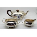 A bachelor's three piece silver tea service, Birmingham 1924, of bulbous oval form with gadrooned