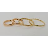 Two 14k child's rings size 15 (approx) weight 2.3gms, an 18ct wedding ring size M, and a similar