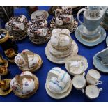 An Edwardian Imari pattern teaset, three Minton Ardmore trios and an Aynsley teaset with yellow