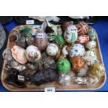 A collection of egg shaped trinket trinket boxes and other items Condition Report: Available upon