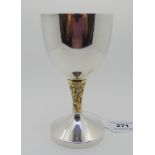 A silver goblet, London 1975, the stem with flowerhead and tendril decoration, 15cm high, 226gms