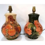 A Moorcroft Finches pattern table lamp and a Hibiscus pattern table lamp Condition Report: Available