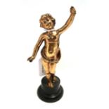 A gilded metal of a child on wooden base, 17cm high Condition Report: