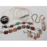 Two silver and agate bracelets, a Marius Hammer enameled filligree brooch and other items