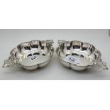 A pair of silver dishes, Sheffield 1907, the lobed body with gadrooned rim with a pair of ribbon