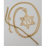 A 14k gold Star of David with a 14k rope chain (needs clasp) and a piece of yellow metal chain,