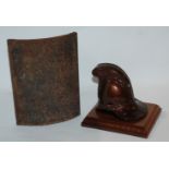 A cast iron warning notice, 19 x 14cm and a paperweight formed as a fire helmet Condition Report: