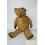 A vintage Teddy bear, 60cm high Condition Report: Available upon request