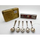 A lot comprising a 1914 Christmas box and six assorted EP souvenir spoons Condition Report: