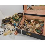 A ladies compendium, two vintage gold plated bangles, horn beads, cultured pearls and other items