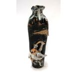 A Sumida Gawa vase decorated with a man and a broom 20cm high Condition Report: Available upon