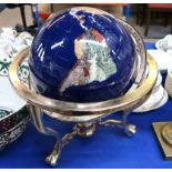 A large hardstone globe of the world on brass stand Condition Report: Available upon request