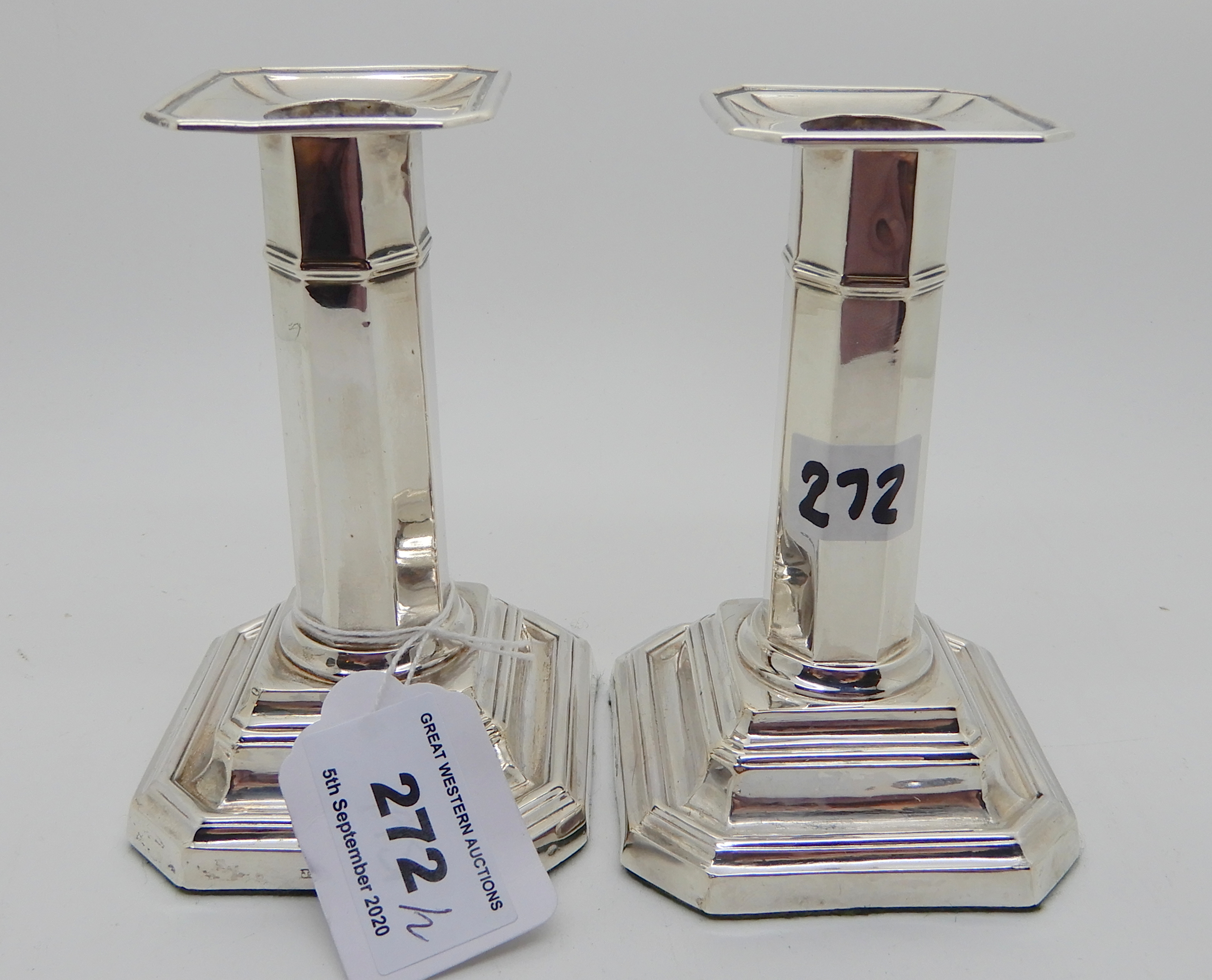 A pair of silver candlesticks, Sheffield 1918, the octagonal stem on stepped square pedestal base - Image 2 of 4