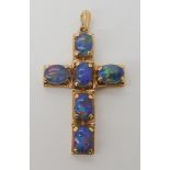 A 9ct gold opal triplet set cross dimensions 4.8cm x 2.6cm, weight 6.7gms Condition Report: