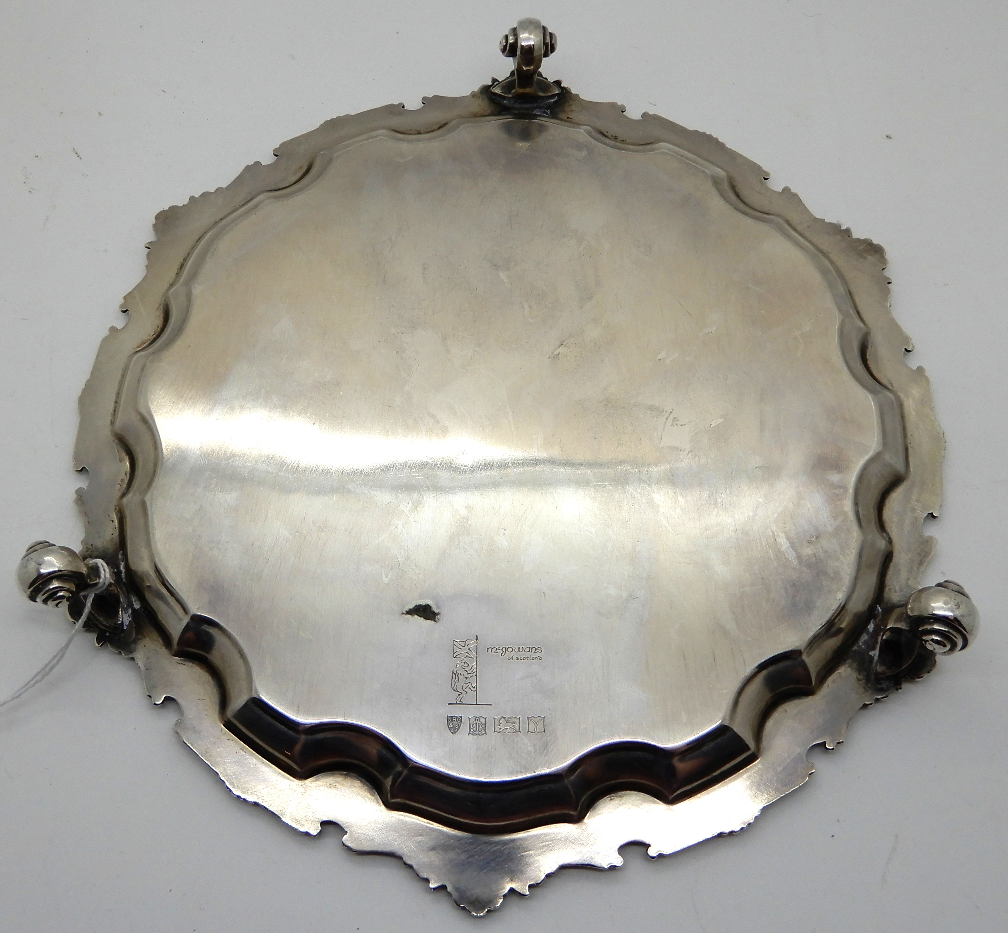 A silver card tray, Birmingham 1973, of circular form, the scalloped rim with shell motif on three - Image 3 of 3