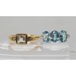 A 9ct white gold blue zircon and white topaz ring size O, together witha 9ct yellow gold glacier