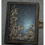 A Victorian leather bound musical photograph album (def) and black lacquer bound album Condition