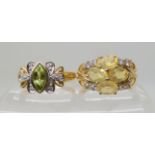 A 9ct gold marquis cut peridot and diamond ring size N1/2, and a 9ct fire opal and white topaz