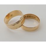 An 18ct gold wedding band size M1/2, size 2.6gms, and another stamped 14 weight 1.9gms Condition