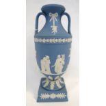 A Wedgwood blue jasperware two handled vase, decorated with a classical scene of figures, 22cm
