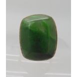 A 9ct gold African green hardstone ring, dimensions 20mm x 16mm, finger size O, weight 9.3gms