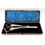 A cased pair of silver grape scissors, Mappin and Webb, Sheffield 1894, 18cm long, 109gms