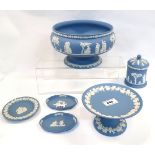 A collection of Wedgwood blue jasper including a footed bowl, a small tazza, a pot and cover and