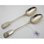A lot comprising two silver basting spoons, London 1869 and 1881, 30cm long, 239gms Condition