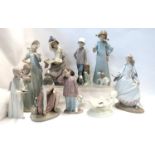 A Royal Worcester salt modelled as a merboy, and nine assorted Lladro and Nao figures Condition