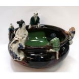 A Sumida Gawa bowl, decorated with a Geisha, monkey, two boys and a man, 20cm diameter Condition