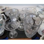 A collection of cut glass and crystal including vases, decanter etc Condition Report: Available upon