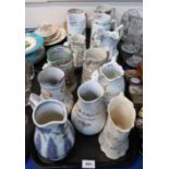 A collection of Scottish pottery jugs with marriage dedications including Fleming Pottery