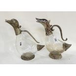 A lot comprising two silver plate and glass claret jugs, modelled as ducks Condition Report: