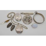 A collection of silver and white metal items to include a locket brooch with a bird, A Ward Brothers
