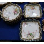 W.A.A. & Co dessert service, painted with flowers comprising eleven plates and four square dishes