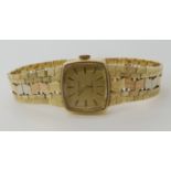 A ladies three colour gold Sandoz quartz watch, length 17cm, weight including mechanism 28.1gms