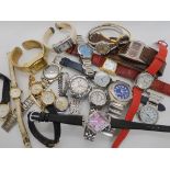A ladies and gents Smiths watch, and a collection of vintage and fashion watches Condition Report: