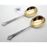 A pair of silver serving spoons, Sheffield 1922, 22cm long, 218gms Condition Report: Available