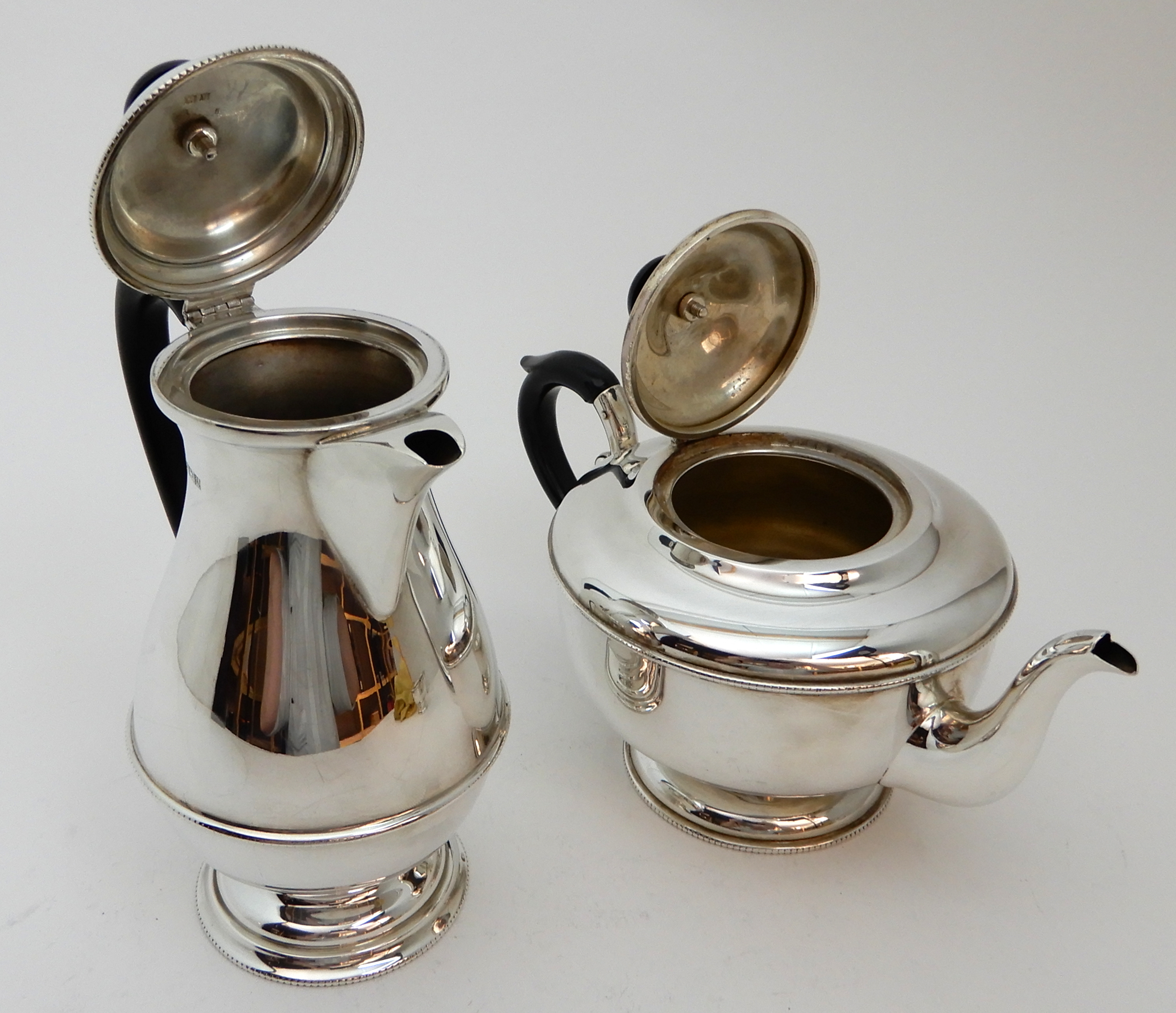 A FOUR PIECE SILVER TEA SERVICE by Henry Clifford Davis, Birmingham 1961, of plain baluster form - Image 4 of 8